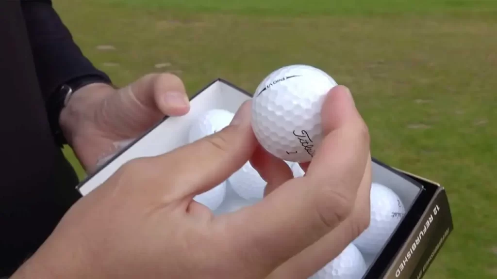 opening a golf ball box