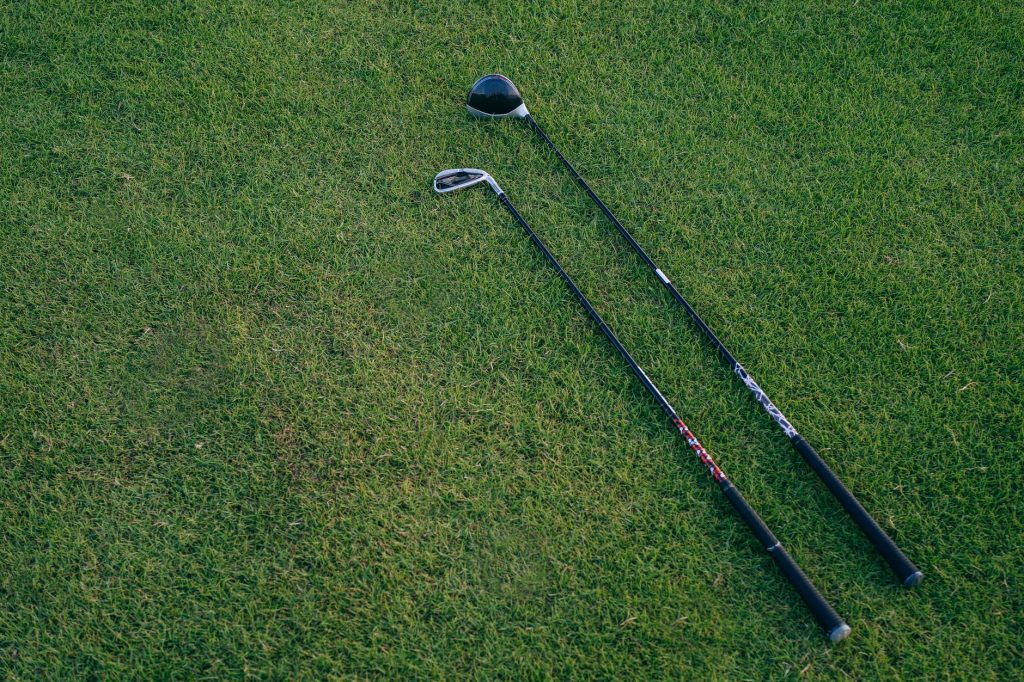 Golf clubs on the grass