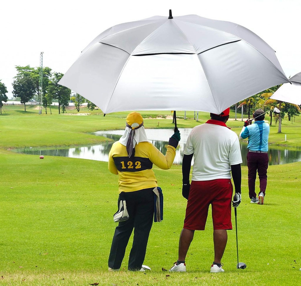 Why are golf umbrellas so big?